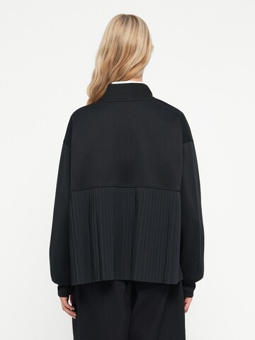 Nike Sportswear Jacke in Schwarz