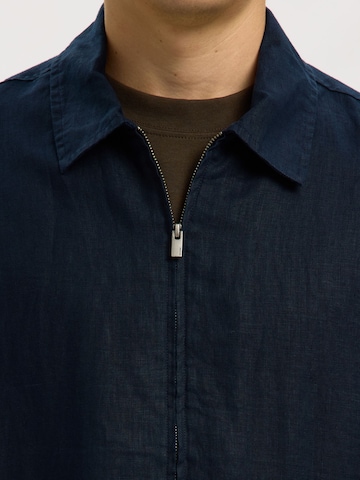 SELECTED Tussenjas in Blauw