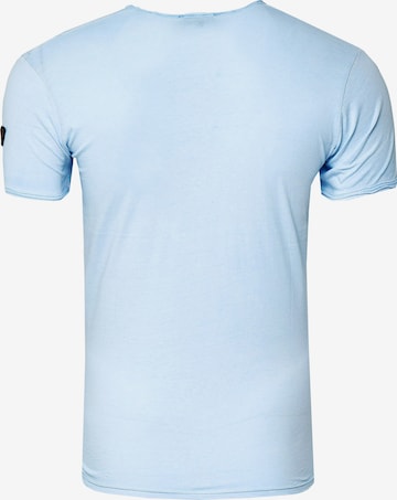 Rusty Neal T-Shirt mit Knopfleiste in Blau