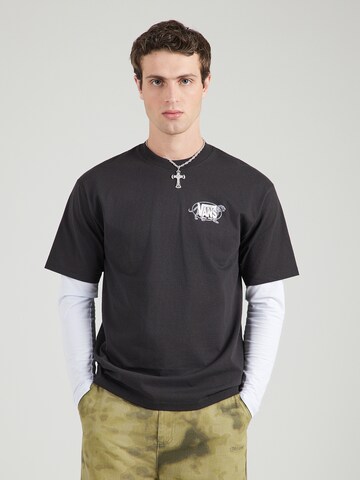 VANS T-Shirt 'Awaken Tiger' in Schwarz