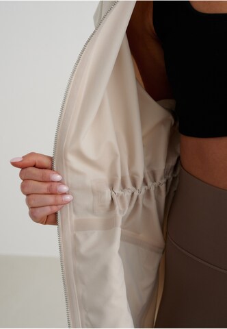 Veste de sport 'Clay' Aim'n en beige