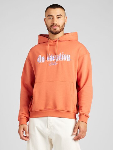 On Vacation Club Sweatshirt in Orange: front