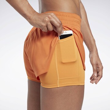 Skinny Pantaloni sport de la Reebok pe portocaliu