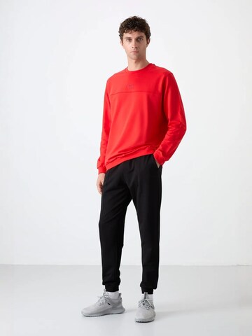 Tuta da jogging di Tommy Life in rosso