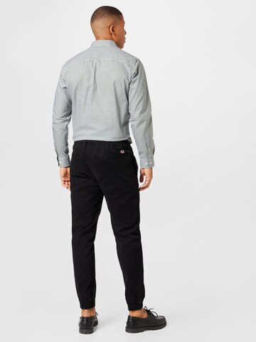 Champion Authentic Athletic Apparel Tapered Hose in Schwarz