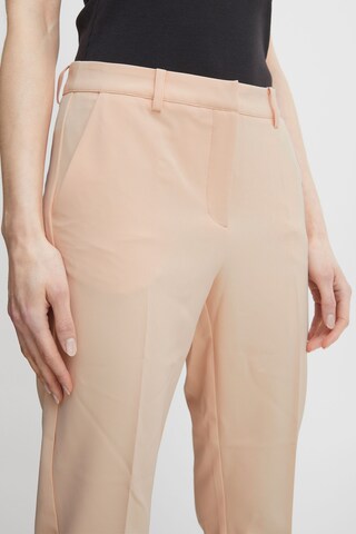 ICHI - Slimfit Calças chino 'LEXI' em laranja