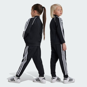 ADIDAS ORIGINALS Juoksupuku 'Adicolor' värissä musta