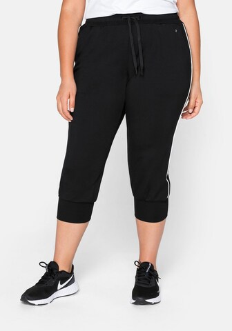 SHEEGO Tapered Pants in Black: front