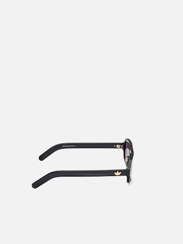 ADIDAS ORIGINALS Zonnebril 'Adidas Originals OR0134 Shiny blue 55/16/145 MAN Sunglasses' in Zwart