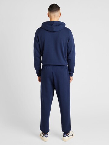 Reebok Tapered Sports trousers in Blue