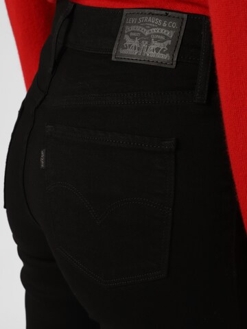 LEVI'S ® Bootcut Jeans in Schwarz