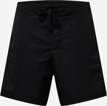 Loosefit Pantaloni de la NU-IN pe negru: față