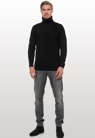 Rusty Neal Pullover in Schwarz