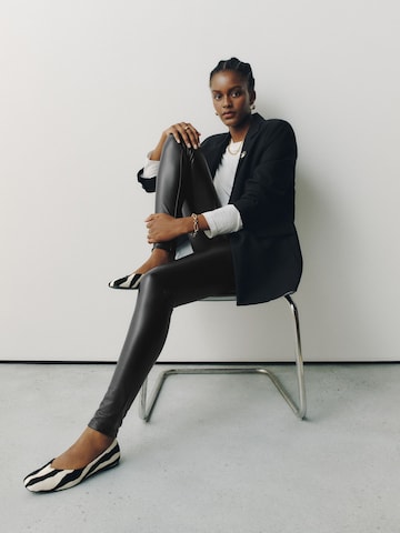 Skinny Leggings di Next in nero