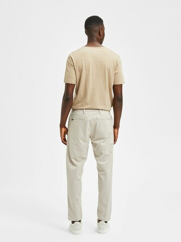 SELECTED HOMME Tapered Chinohousut 'York' värissä beige