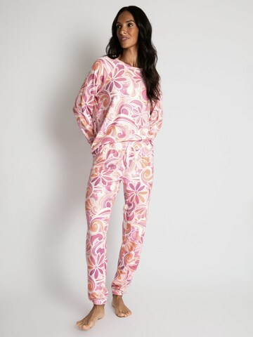 Pantalon de pyjama 'Stay Groovy' PJ Salvage en rose