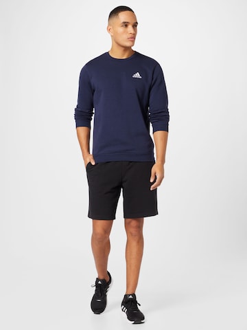 ADIDAS SPORTSWEAR - Sweatshirt de desporto 'Essentials' em azul