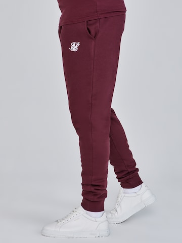 Effilé Pantalon SikSilk en rouge