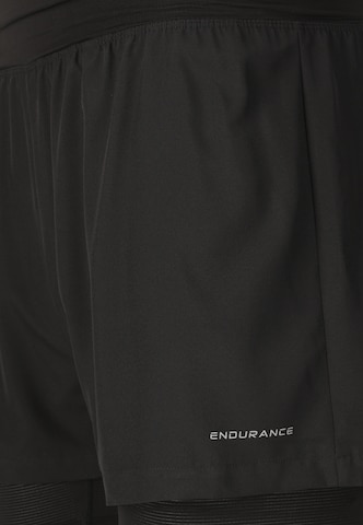 ENDURANCE Regular Sports trousers 'Less' in Black