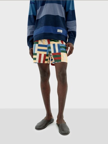 Shorts de bain ' LIMPOPO ' Thinking MU en jaune : devant