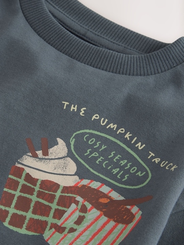 Next Shirt in Grau