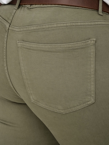 Skinny Jeans 'CARWILLY' di ONLY Carmakoma in grigio