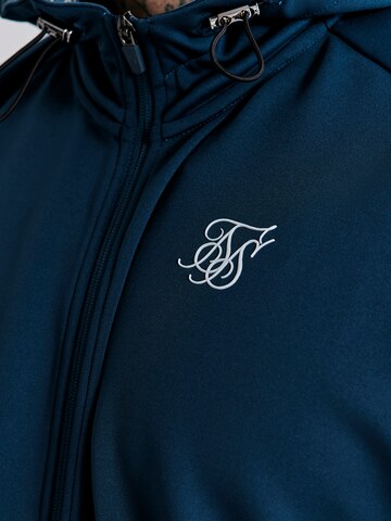 Veste de survêtement SikSilk en bleu