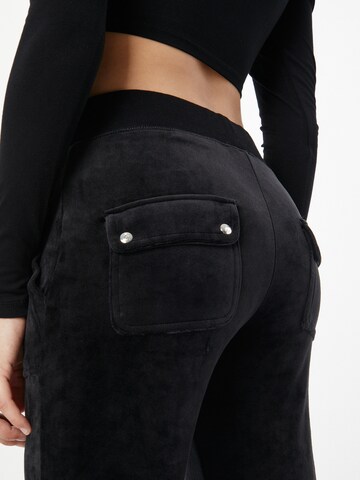 Flared Pantaloni 'LAYLA' di Juicy Couture in nero