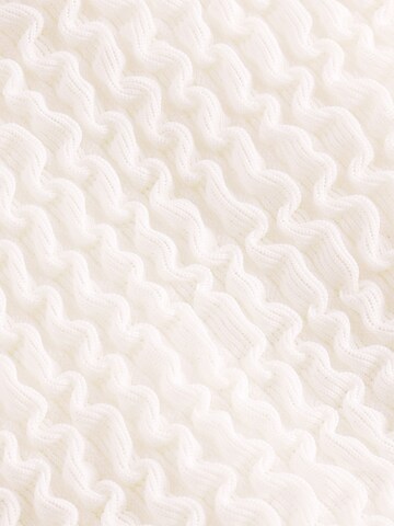 Slip bikini di self. in beige