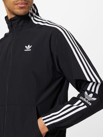 ADIDAS ORIGINALS Between-Season Jacket 'Adicolor Classics Trefoil' in Black