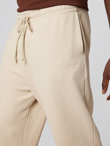 Loosefit Pantaloni 'Milo' di Sinned x ABOUT YOU in beige