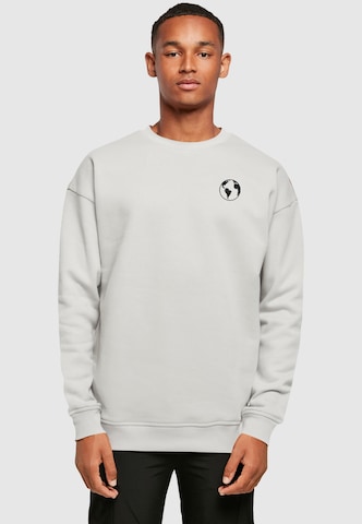 Sweat-shirt 'Explore The World' Merchcode en gris