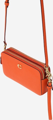 COACH Skuldertaske i orange: forside