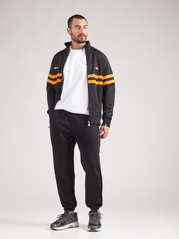 ELLESSE Zúžený Kalhoty 'PATRAS' – černá