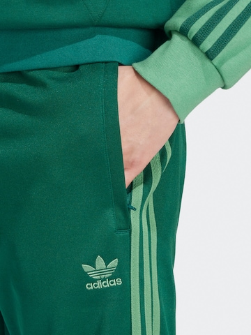 ADIDAS ORIGINALS Tapered Pants 'Adicolor Classics Sst' in Green