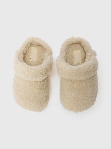 Pantoufle 'Classic Cozzzy' Crocs en beige