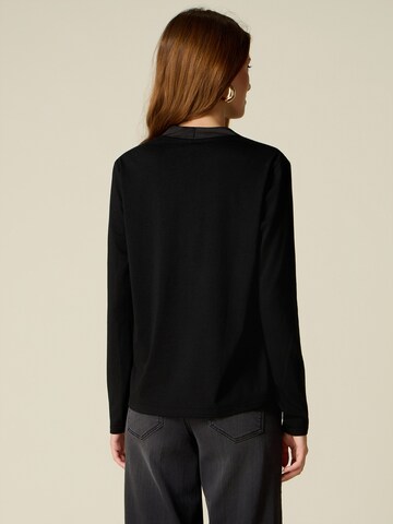 Camicia da donna di oltre in nero