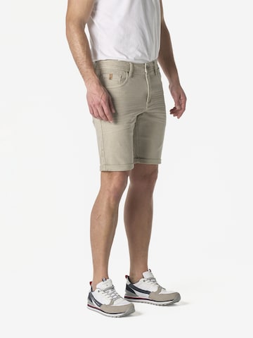 Regular Jeans de la KOROSHI pe bej