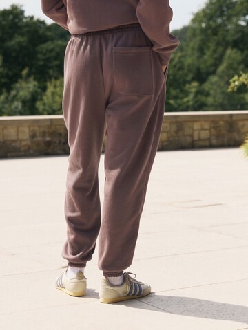 Next Tapered Hose in Braun