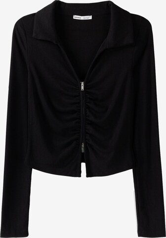 Bershka Knit cardigan in Black: front