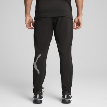 PUMA Tapered Sporthose 'Train All Day' in Schwarz