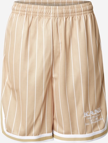 Karl Kani Loosefit Housut värissä beige: etupuoli