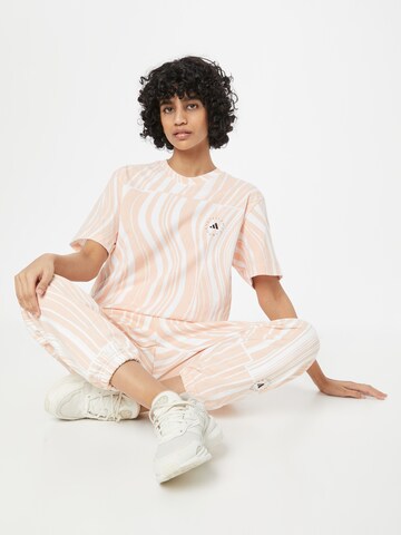 Tricou funcțional 'Truecasuals Graphic' de la ADIDAS BY STELLA MCCARTNEY pe roz