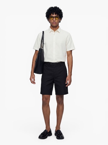 SELECTED - Loosefit Pantalón 'SLHAXEL JARI' en negro