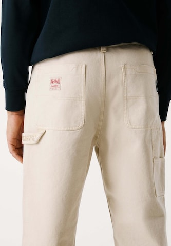 Loosefit Pantaloni 'Carpenter' di Red Bull Racing x Pepe Jeans in beige