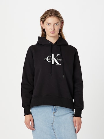 Sweat-shirt Calvin Klein Jeans en noir : devant