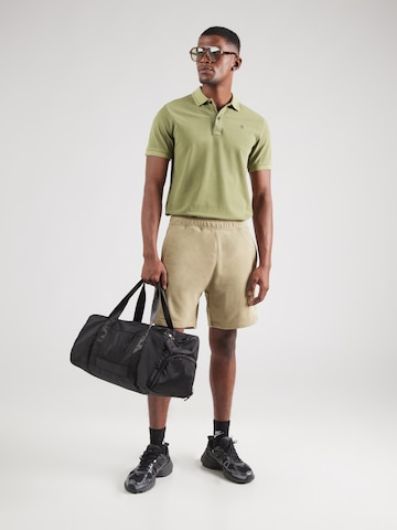 Nike Sportswear Обычный Штаны 'AIR' в Зеленый