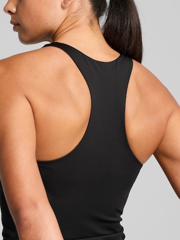 Top 'Puma W Tad Essential 2 In 1 Tank' di PUMA in nero