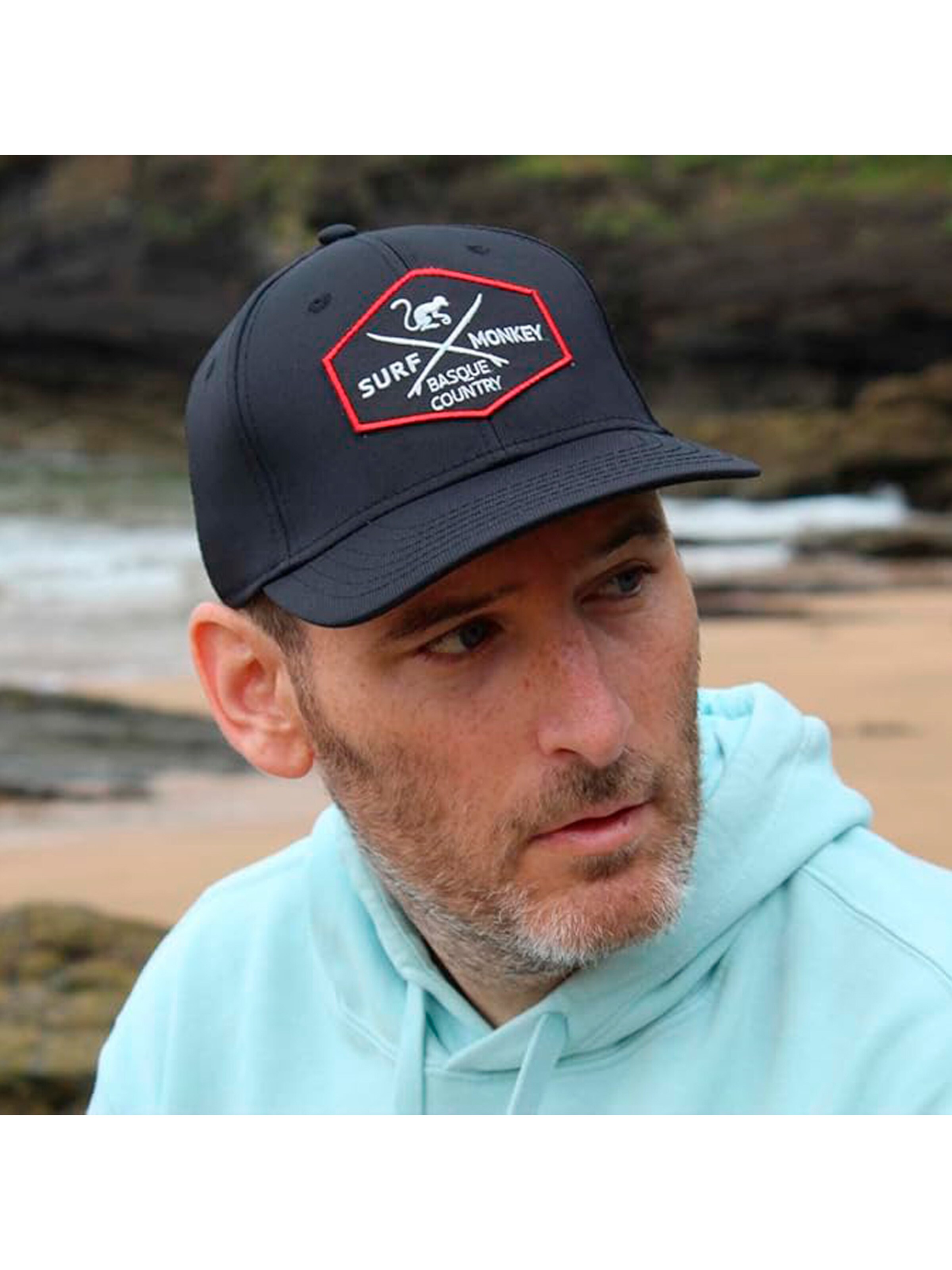 Cappello da baseball sportivo di Surf Monkey in nero