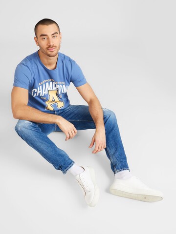 AÉROPOSTALE - Camiseta 'CHAMPIONS' en azul